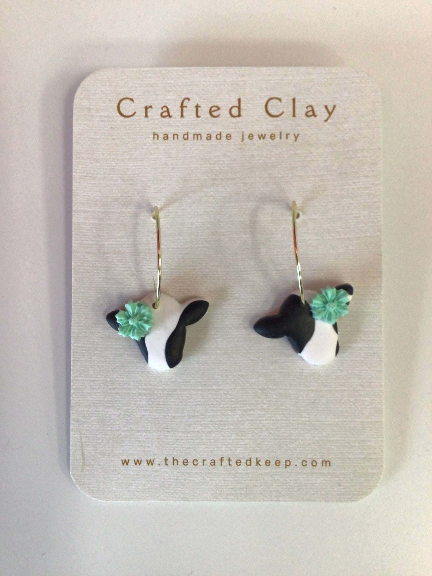 TCK - Clay Black/White Cow Earrings (mint green flower)